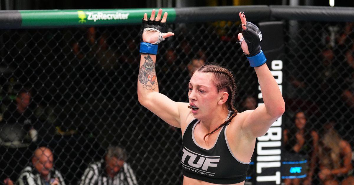 Juliana Miller finishes Brogan Walker in the third round to win TUF 30. Photo by ESPN.