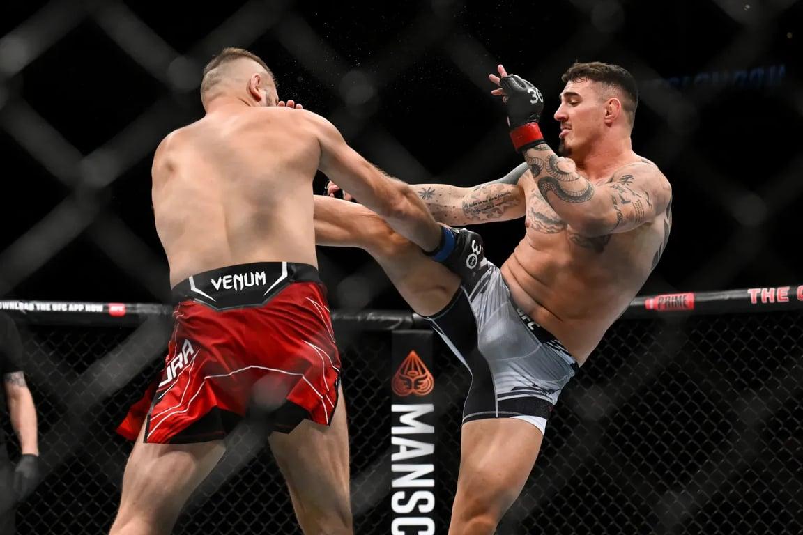 Tom Aspinall kicking Marcin Tybura. Credits to: Haljestam - USA TODAY Sports.