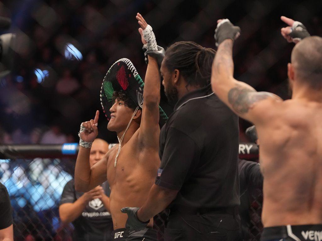 Raul Rosas Jr celebrating after his submission victory against Jay Perrin. Credits to: Stephen R. Sylvanie - USA TODAY Sports.