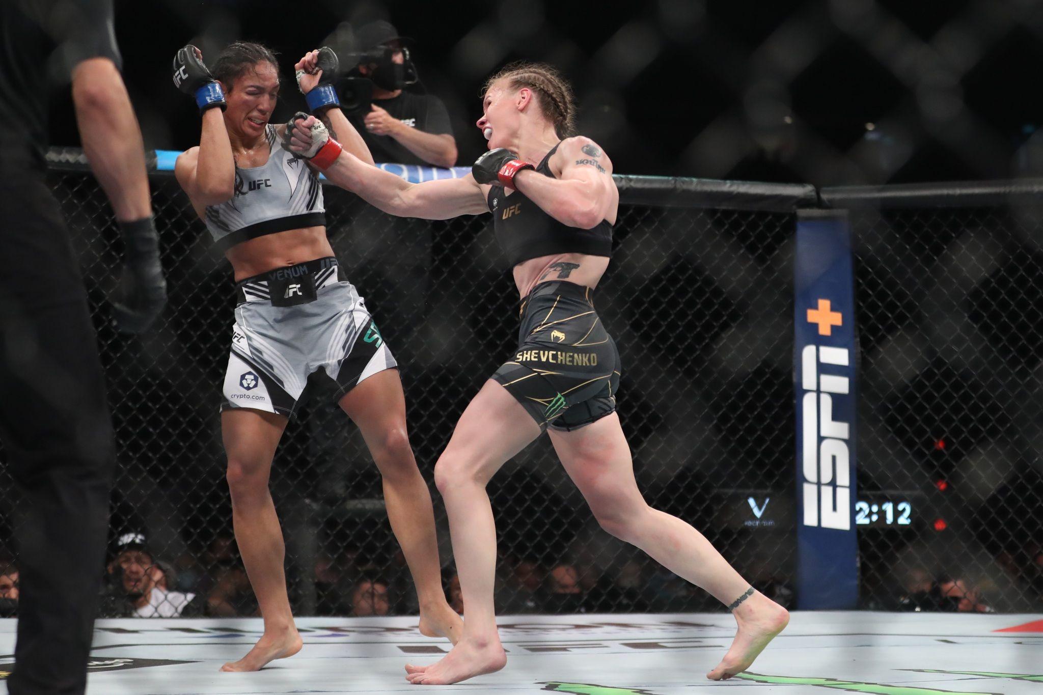 Shevchenko lands a flurry against Taila Santos in a thrilling war. Credit: Paul Miller-USA TODAY Sports