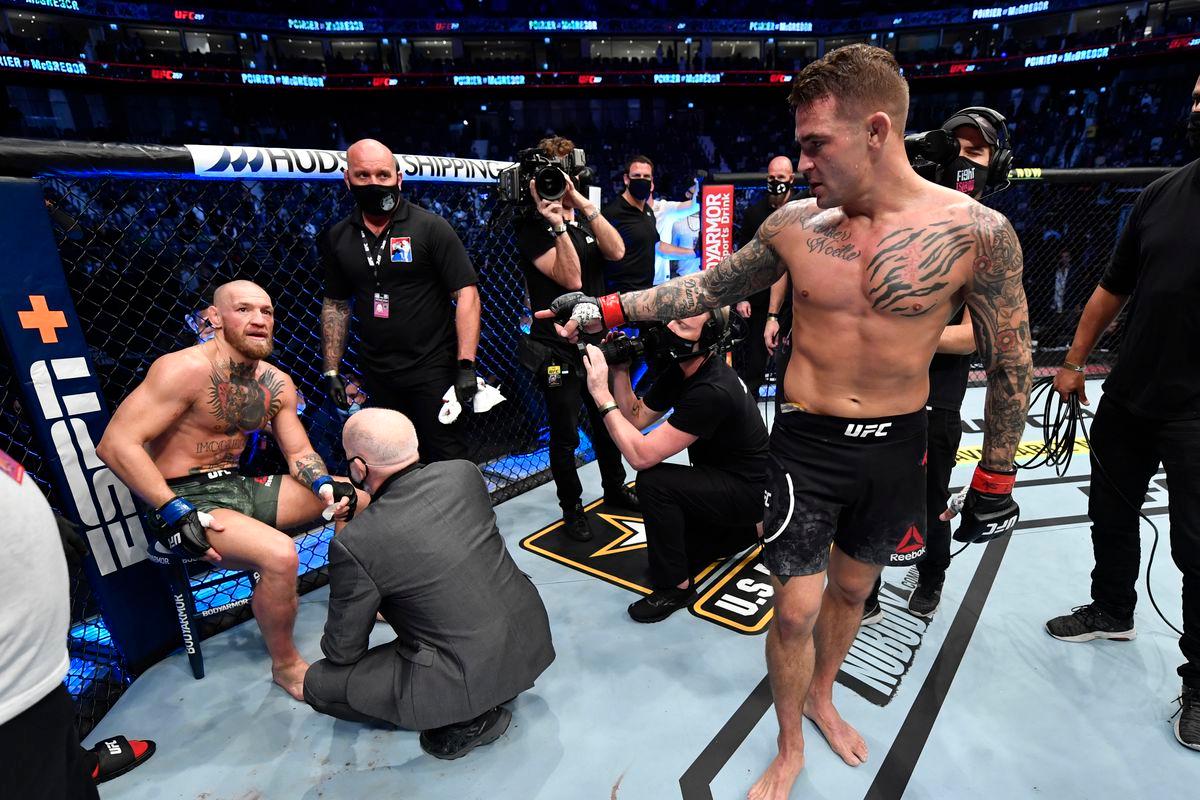 Dustin Poirier taunts Conor McGregor after finishing him in round 2. Credit: MMA Fighting.