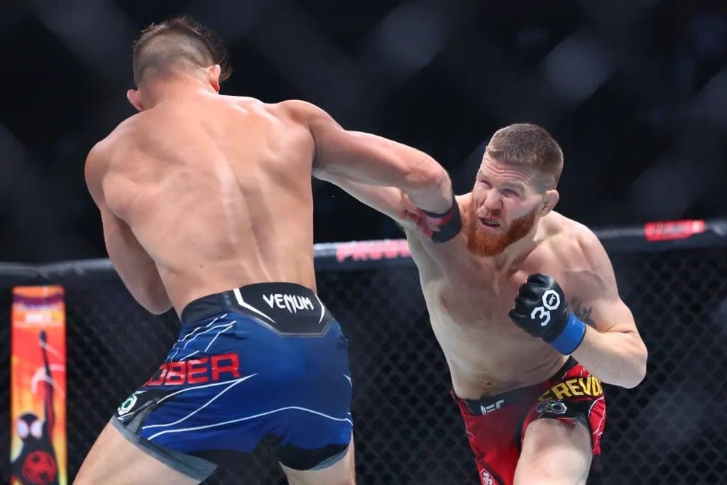 Matt Frevola throwing heat against Drew Dober during their bout at UFC 288. Credits to: Ed Mulholland - USA TODAY Sports.