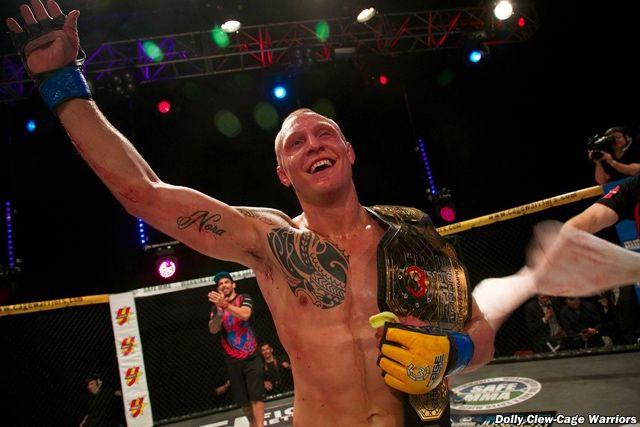 Jack Hermansson celebrating a Championship win in Cage Warrios. Credits to: Dolly Clew-Cage Warriors.