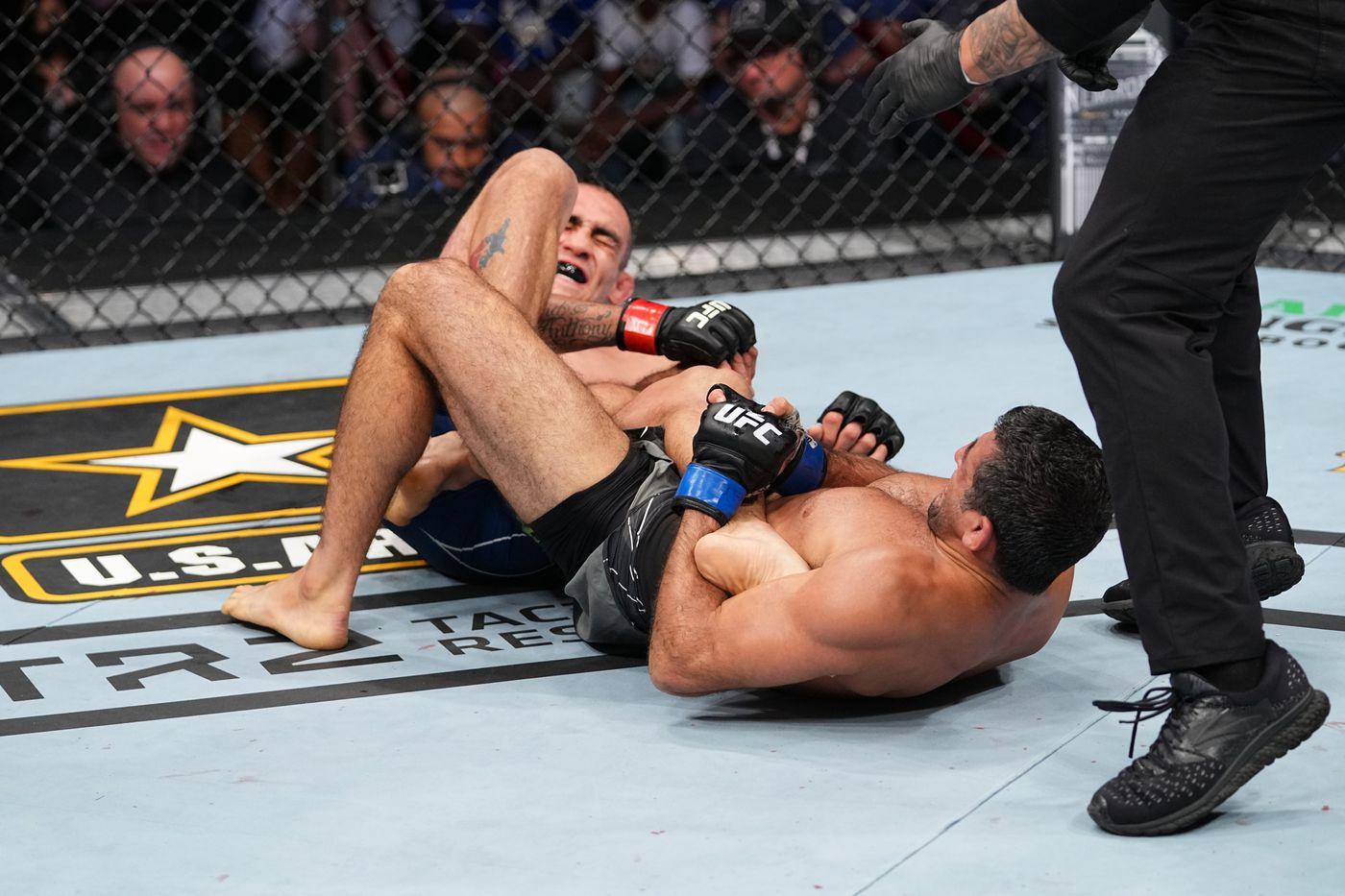 Beneil Dariush attempts a heel hook on Tony Ferguson. Credit to: MMA Mania.