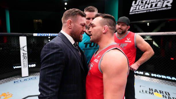 Conor McGregor and Micahel Chandler facing off in the octagon; filming the Ultimate Fighter. Credits to: Chris Unger - Zuffa LLC.