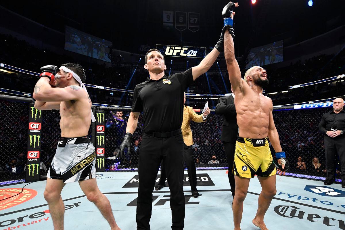 Deiveson Figueiredo celebrates his title victory at UFC 270. Credit to: MMA Fighting.