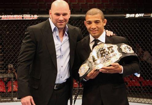 Jose Aldo being presented with the UFC Featherweight belt. Credits to: John Morgan - MMAJunkie.