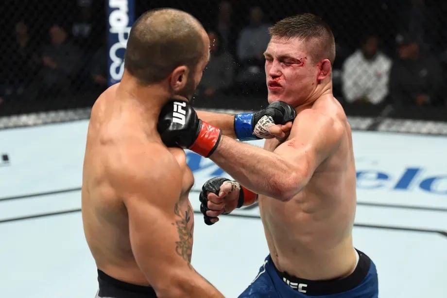 Drew Dober and Frank Camacho scrapping their way to a Fight of The Night decision. Credits to: Josh Hedges - Zuffa LLC.
