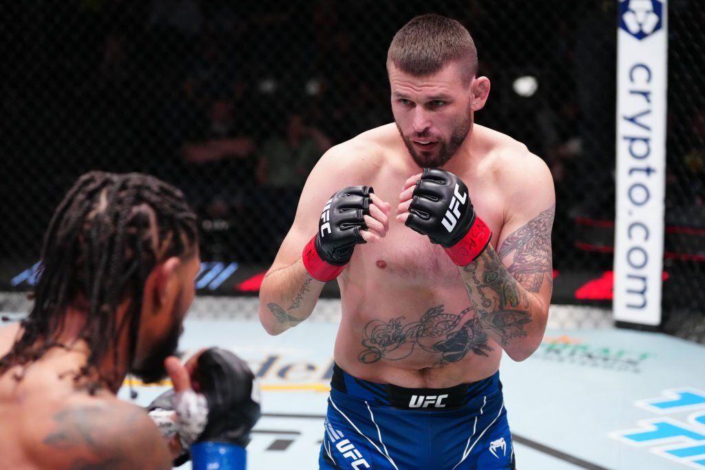 Tim Means engages Max Griffin at the UFC Apex. Credits to: Jeff Bottari - Zuffa LLC