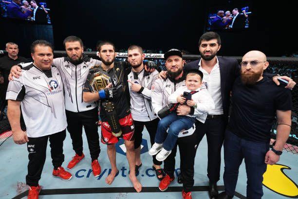 Islam Makhachev with his team after winning at UFC 280. Credits to: Chris Unger-Getty Images.