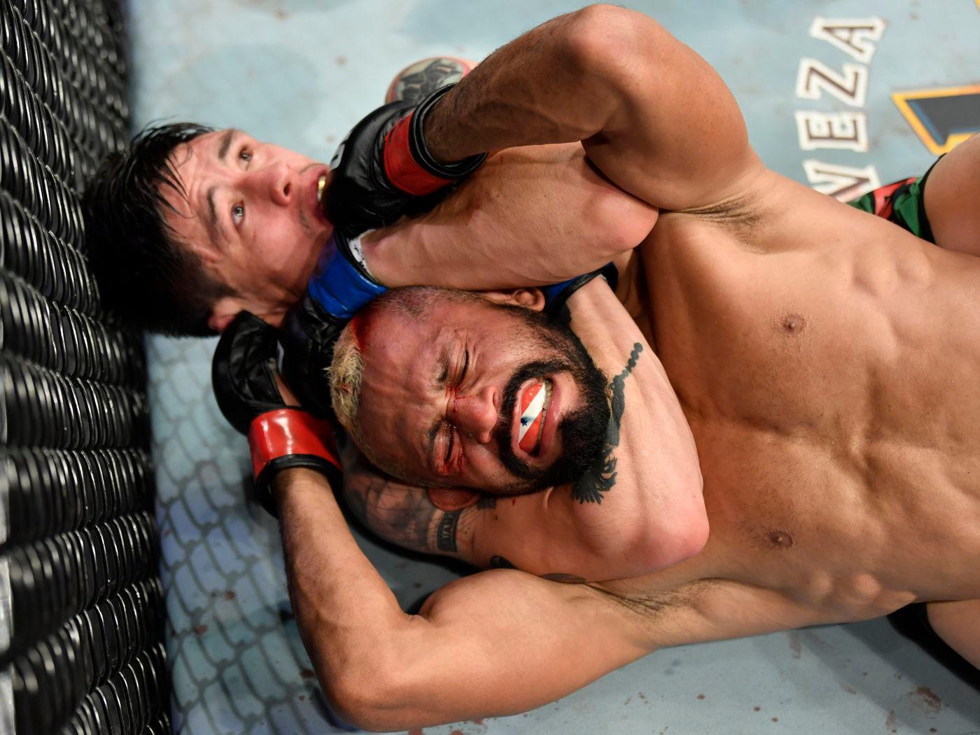 Brandon Moreno submits Deiveson Figueiredo at UFC 263. Credit to: MMA Fighting.