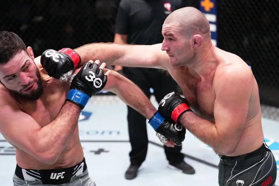 Nassourdine Imavov eating a straight against Sean Strickland in his first UFC main event. Credits to: Chris Unger - Zuffa LLC.