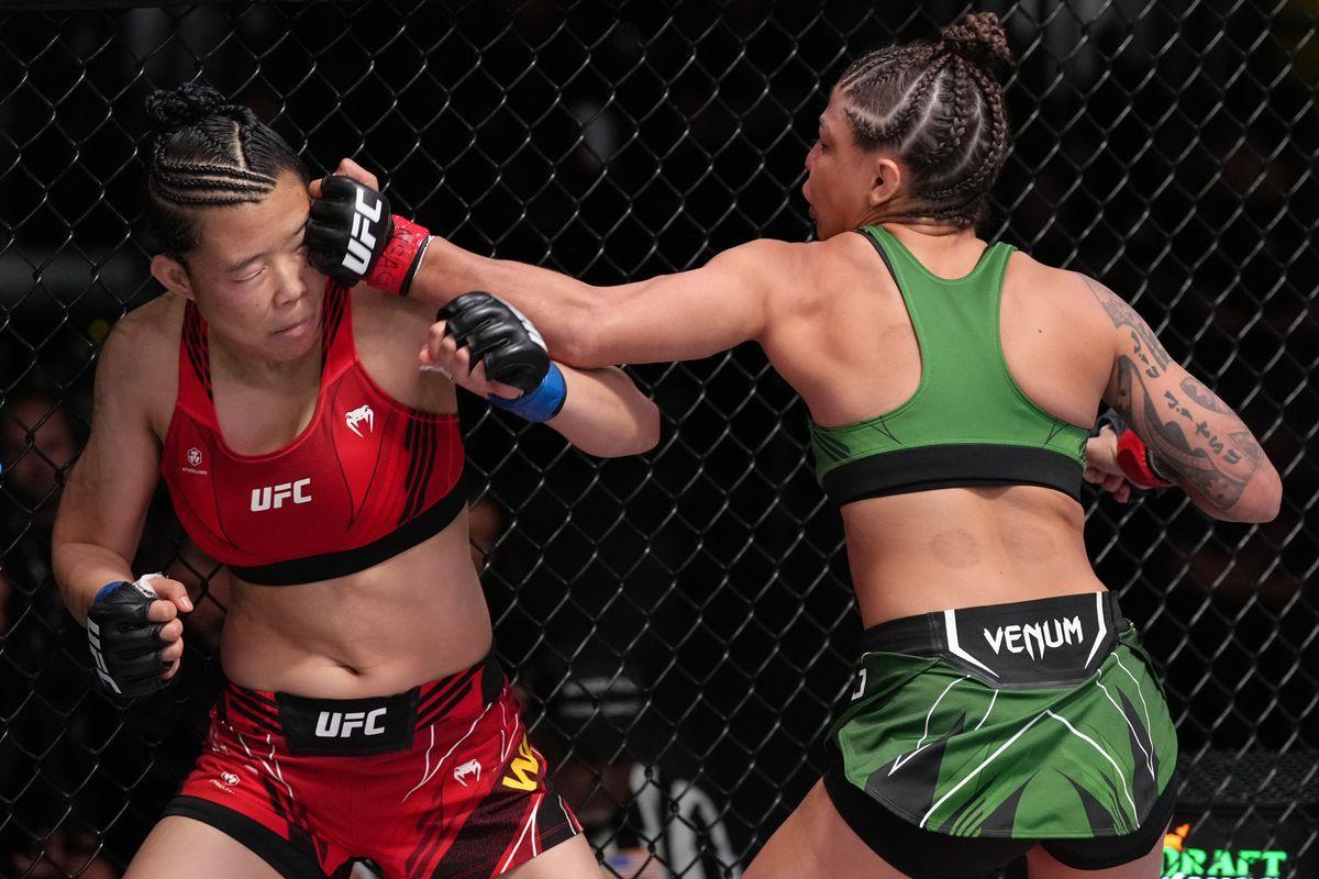 Mayra Bueno Silva lands a left hook on Wu Yanan. Credit: MMAFighting.