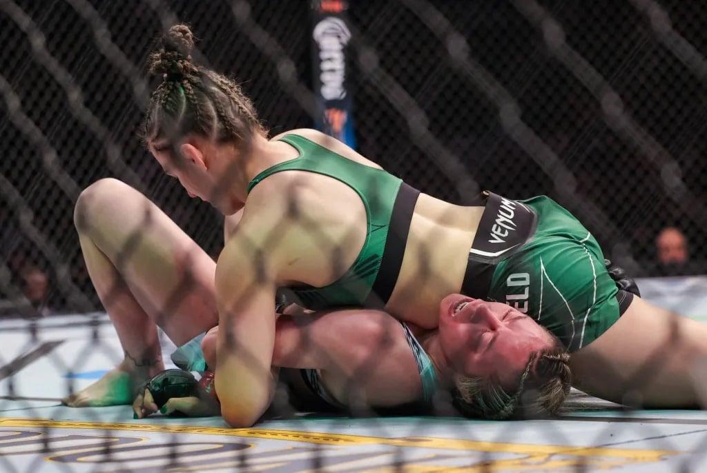 Erin Blanchfield securing a kimura over Molly Mccan at UFC 281. Credits to: Jessica Alcheh - USA TODAY Sports.