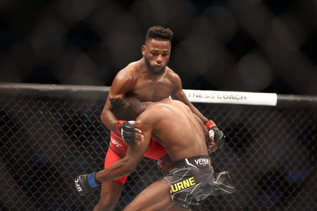 Manel Kape moments after landing a flying knee on Ode Osborne at UFC 265. Credits to: Troy Taormina - USA TODAY Sports.