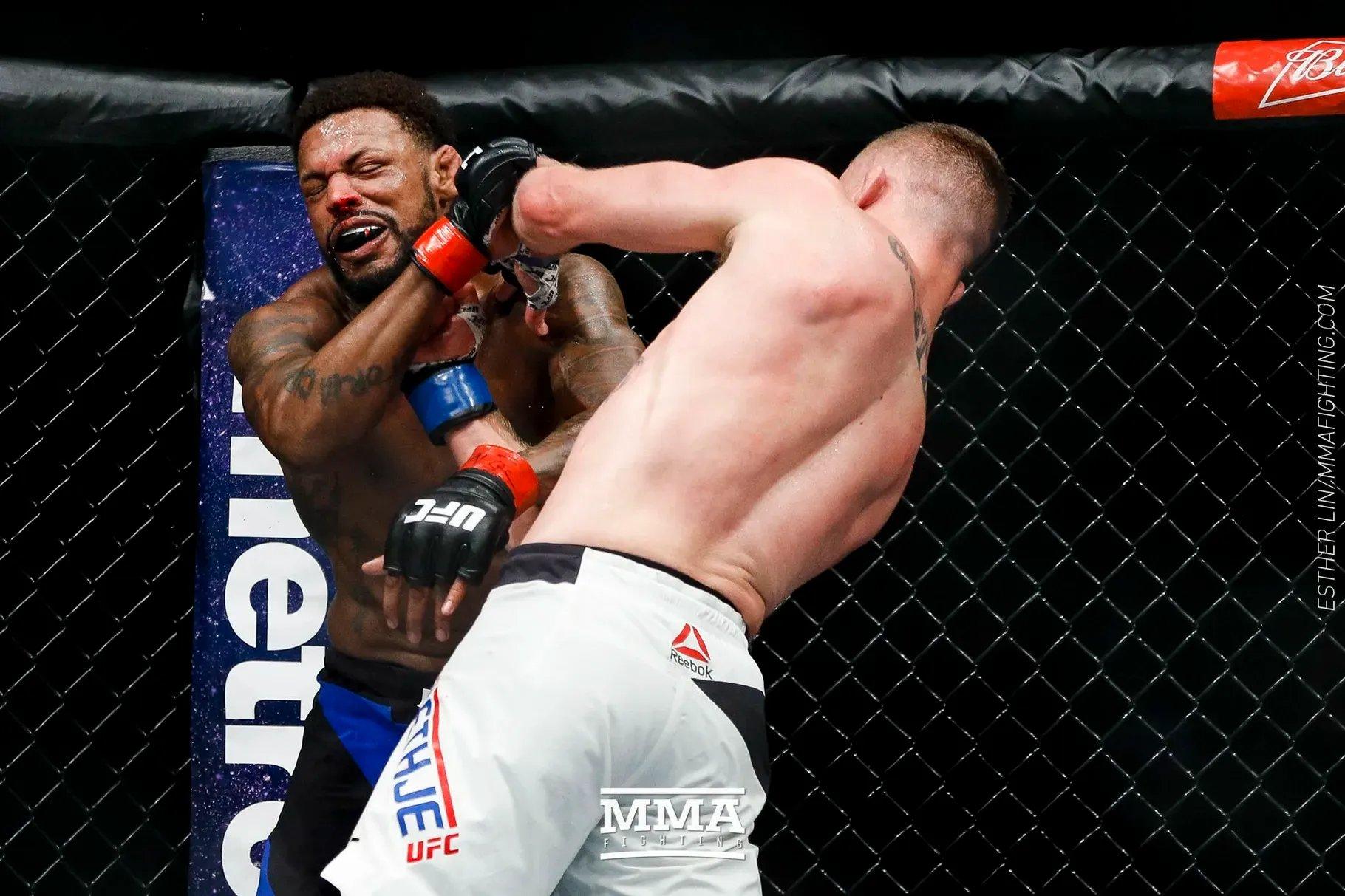 Michael Johnson in his Fight of the Year with Justin Gaethje. Credit: Esther Lin,/MMA Fighting.