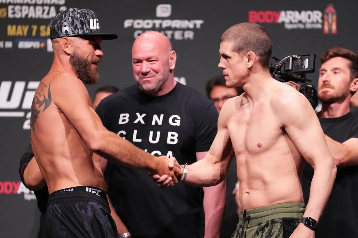 Joe Lauzon and Donald Cerrone faceoff before their cancelled bout at UFC 274. Credits to: Chris Unger-Getty Images