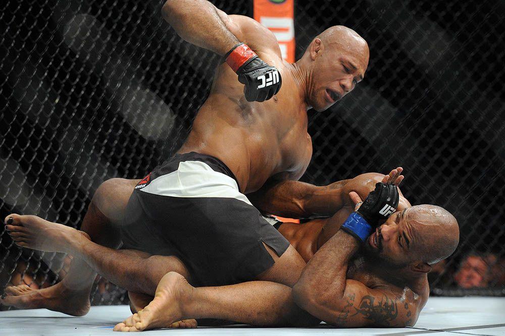 Jacare pours on heavy strikes against Yoel Romero on the ground. Credits to: Gary A Vasquez-USA TODAY Sports
