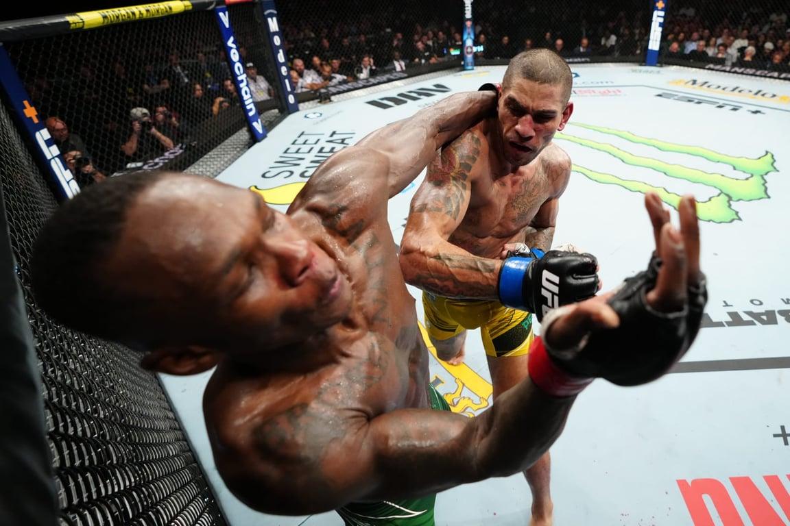 Alex Pereira landing a huge shot on Israel Adesanya at UFC 281. Credits to: Jeff Bottari - Zuffa LLC.