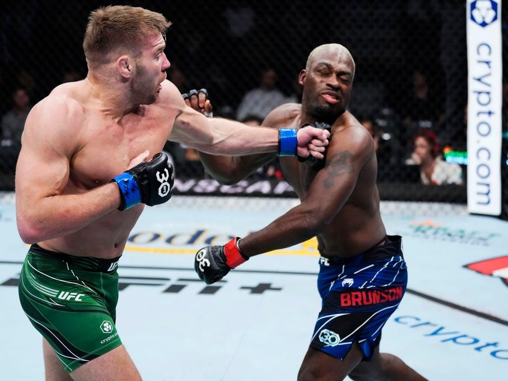 Dricus Du Plessis landing on Derek Brunson during their bout at UFC 285. Credits to: Dan Hiergesell - MMA Mania.