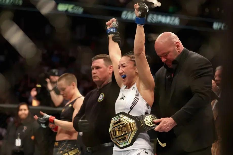 Carla Esparza winning her 2nd UFC Championship. Credits to Christian Petersen-Getty Images