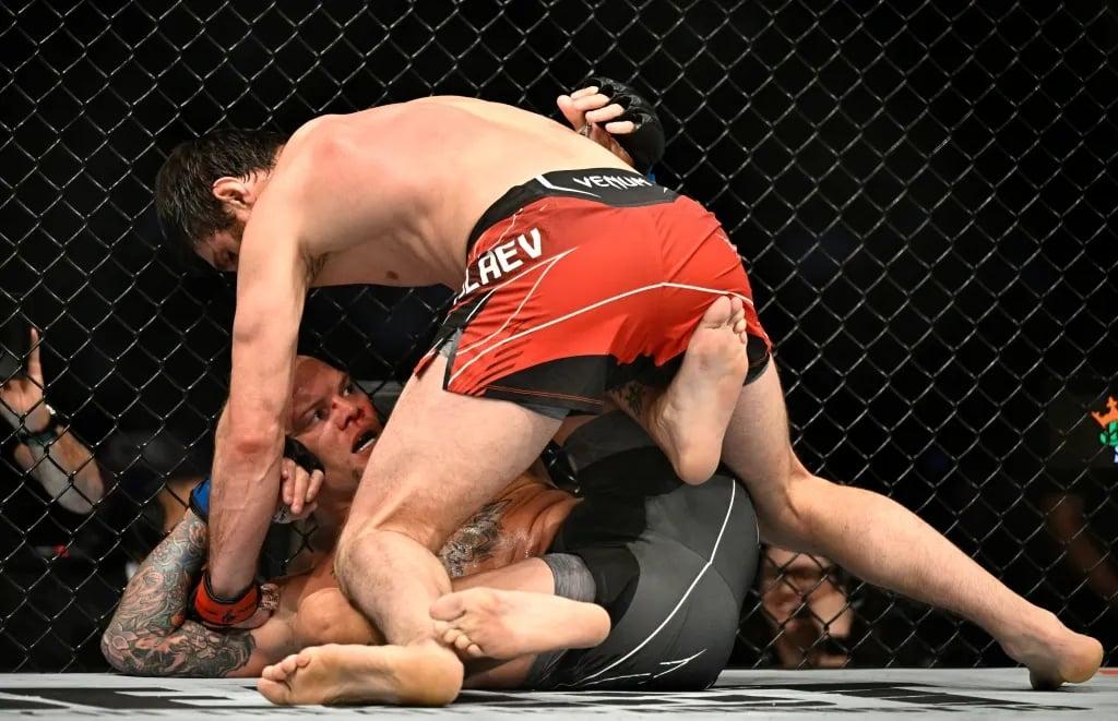 Magomed Ankalaev TKOing Anthony Smith at UFC 277. Credits to: Jerome Miron - USA TODAY Sports.