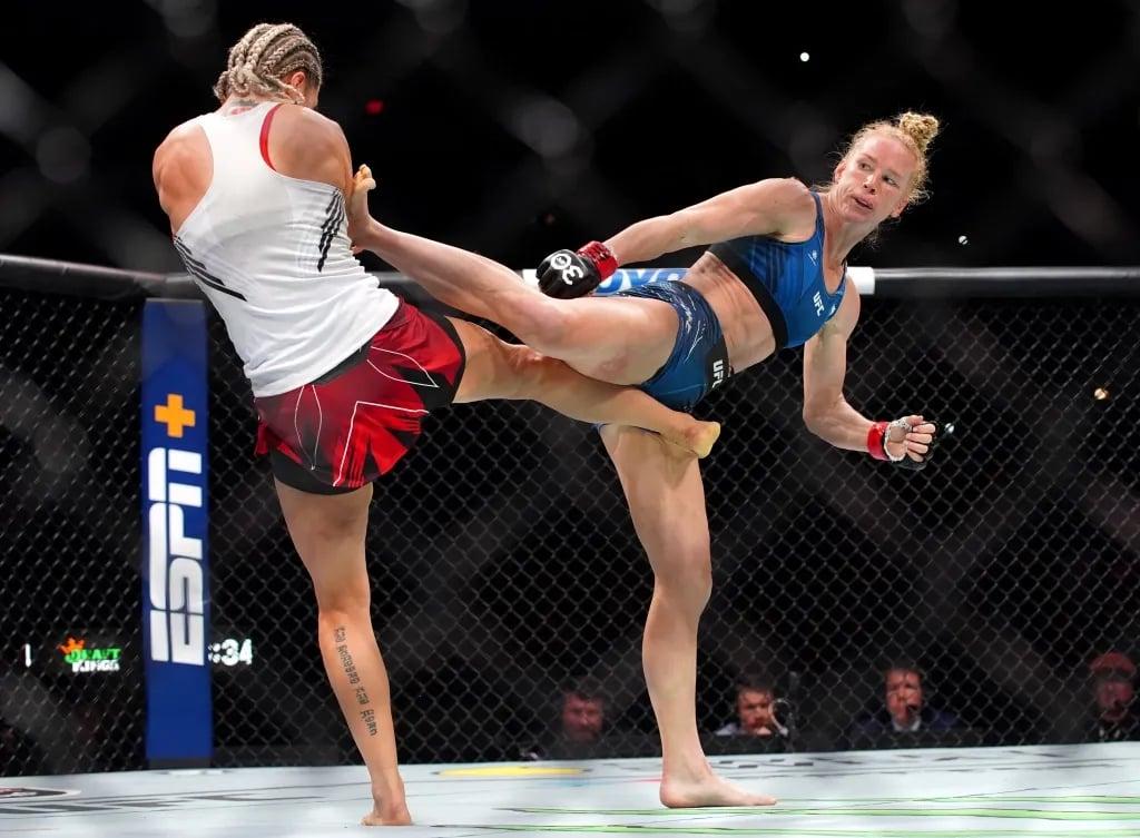 Holly Holm outstriking Yana Santos in her last performance. Credits to: Aaron Meullion - USA TODAY Sports.