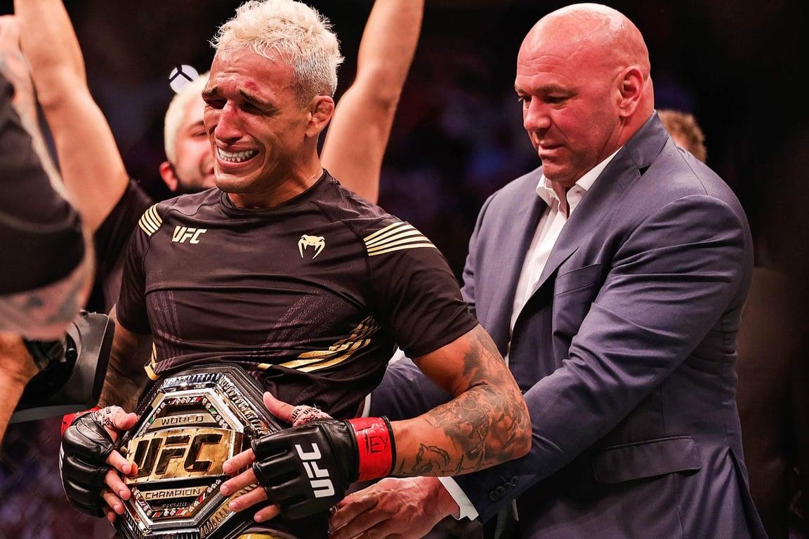 Charles Oliveira realizes his dream of becoming a UFC Champion. (Carmen Mandato/Getty Images)