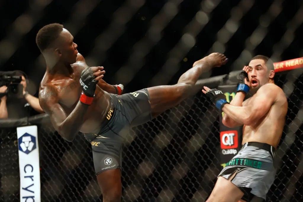 Israel Adesanya and Robert Whittaker fighting in their rematch at UFC 271. Credits to: Troy Taormina-USA TODAY Sports.