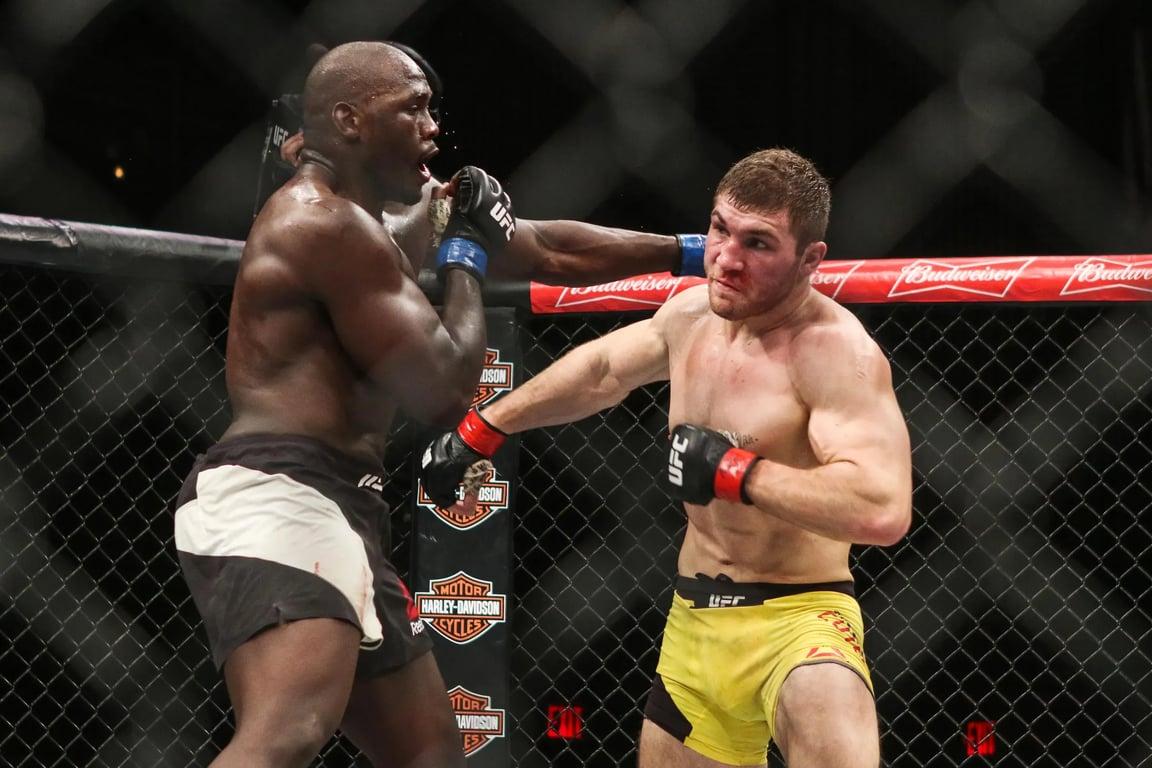 Jared Cannonier and Ion Cuțelaba put on a Fight of the Night. Credit: Tracy Lee - USA TODAY Sports.