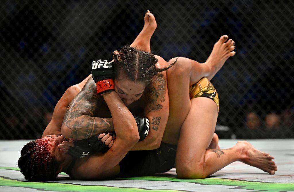 Amanda Nunes dominating Juliana Pena to reclaim her title at UFC 277. Credits to: Jerome Miron - USA TODAY Sports.