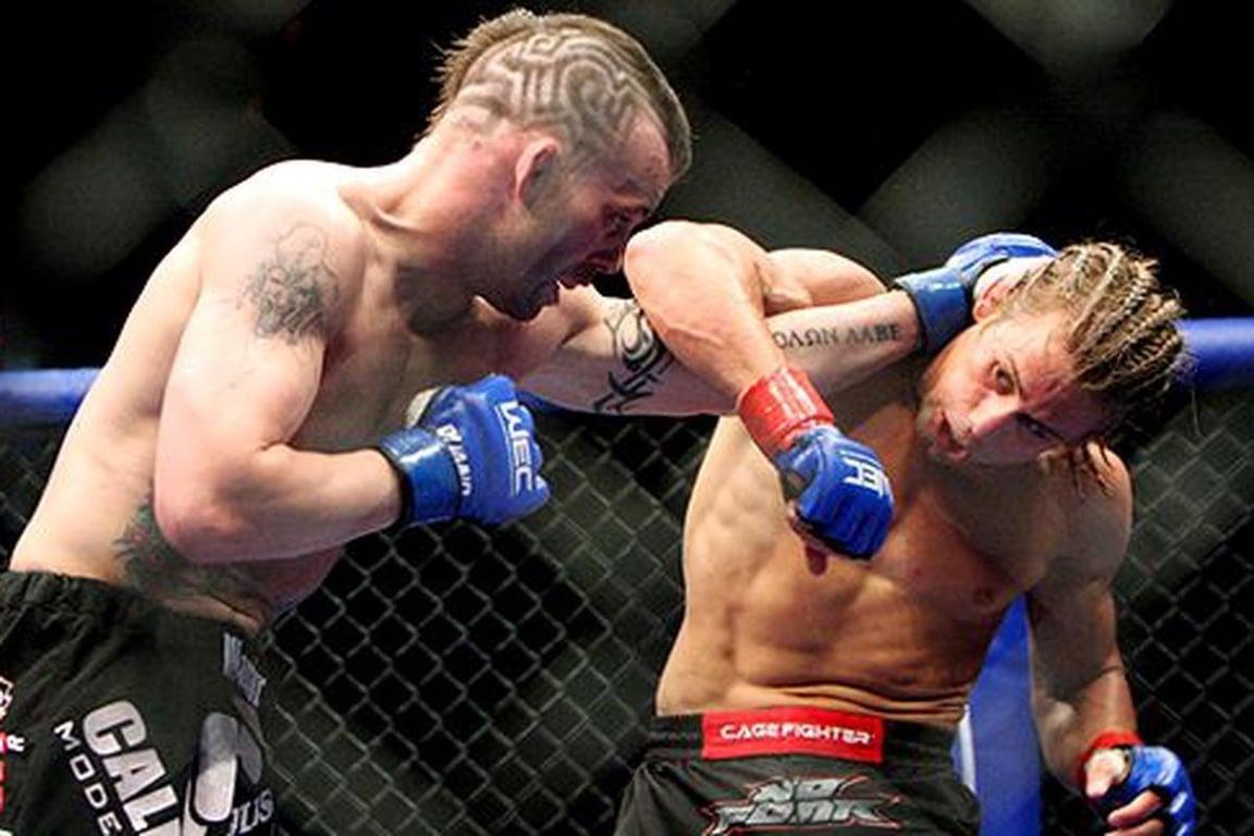 Jens Pulver slugs it out with Urijah Faber. Credits to: Zuffa LLC