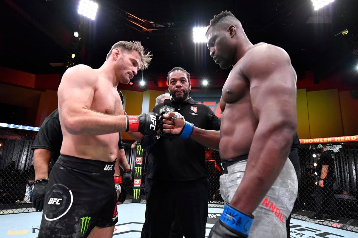 Stipe Miocic and Francis Ngannou touch gloves before UFC 260. Credits to: Jeff Bottari - Zuffa LLC