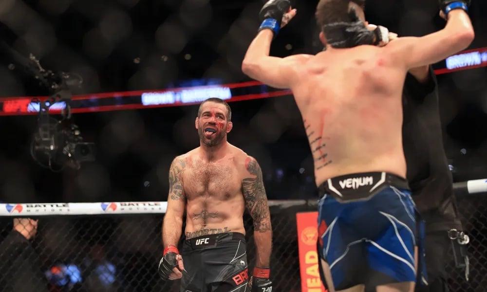 Matt Brown and Bryan Barberena at the end of their fight. Aaron Doster-USA TODAY Sports