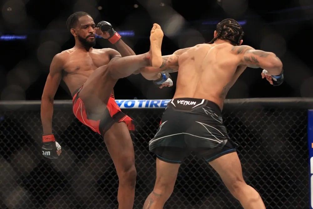 Neil Magny attempting a front kick against Max Griffin. Aaron Doster-USA TODAY Sports