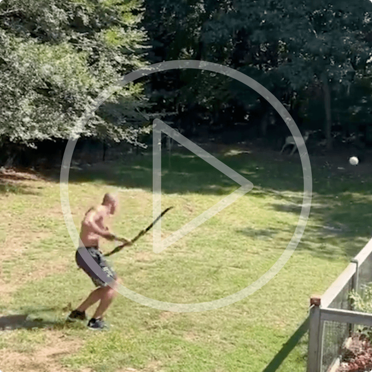 Alex Pereira shows off his archery skills