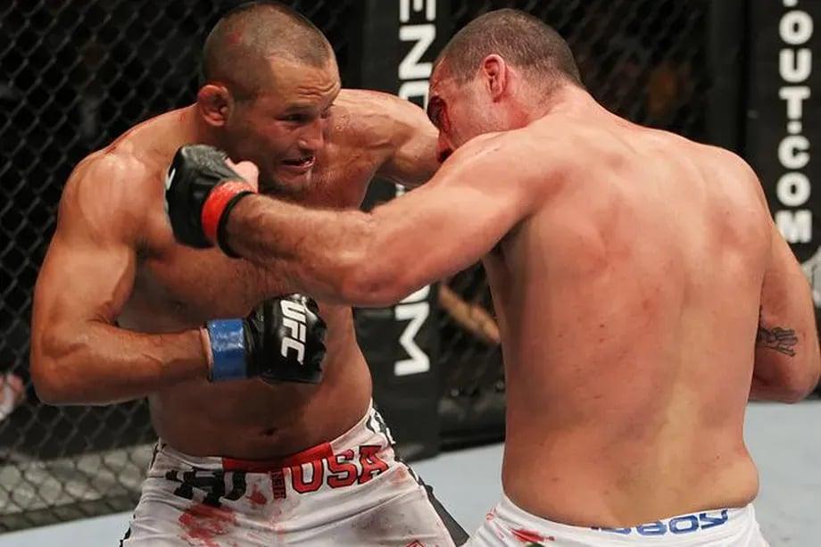 Mauricio Rua and Dan Henderson brawling it out at UFC 139. Credits to: Kevin Haggerty - MMA Mania.