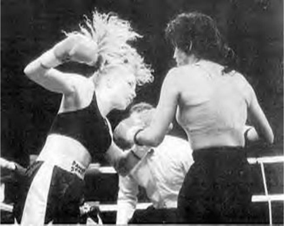 Yvonne Trevino and Brenda Rouse trading punches