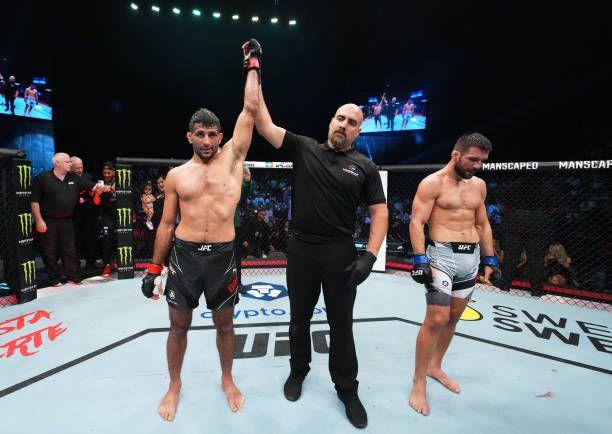 Beneil Dariush getting his hand raised at UFC 280. Credits to: Chris Unger-Getty Images.