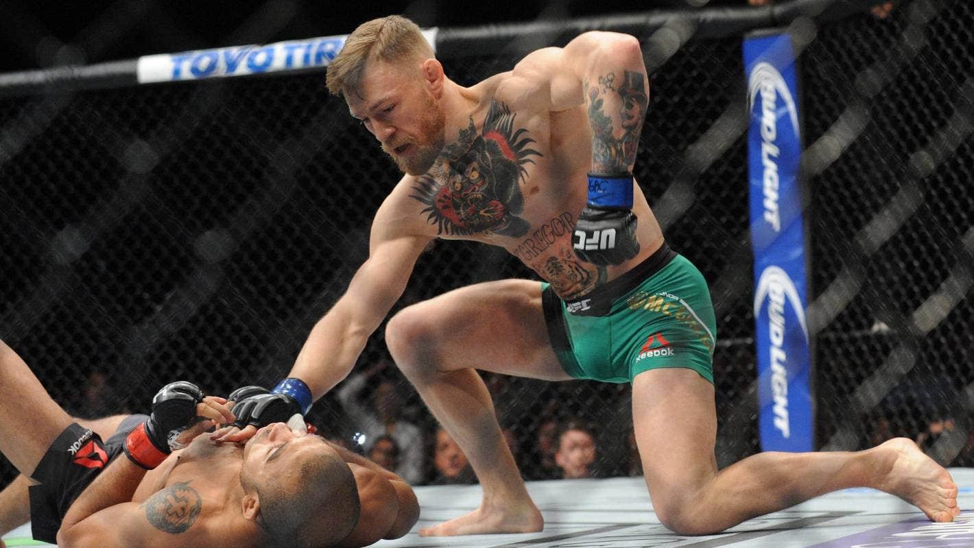 Conor McGregor puts the final touches on Jose Aldo. Credit: Gary A. Vasquez - USA Today Sports