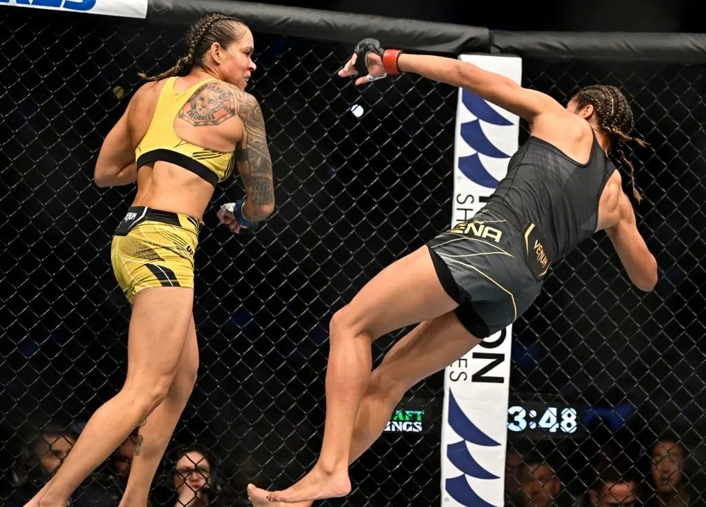 Amanda Nunes knocking down Juliana Pena in their rematch. Credits to: Jerome Miron - USA TODAY Sports.