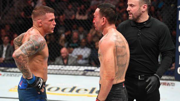 Dustin Poirier and Max Holloway during their first fight. Credits to: Josh Hedges - Zuffa LLC.