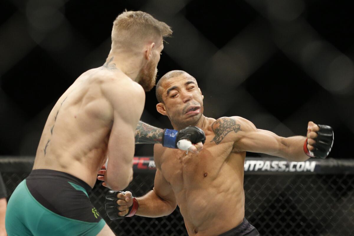 Conor McGregor knocks out Jose Aldo. Credit: LA Times.