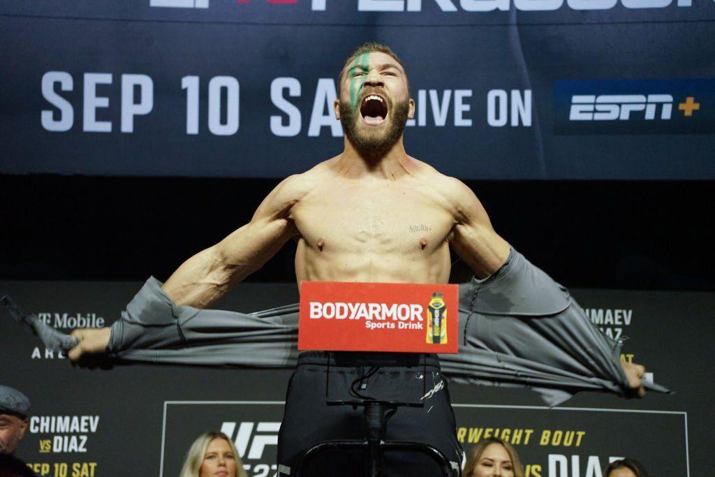 Ion Cutelaba steps on the scale at the ceremonial weigh-ins at UFC 279. Credits to: Amy Kaplan - Zuffa LLC