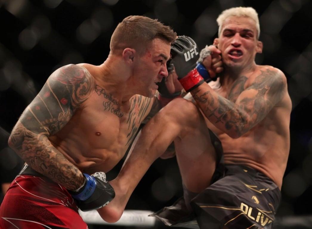 Dustin Poirier battles it out with Charles Oliveira for Lightweight gold. Credits to: Carmen Mandato/Getty Images