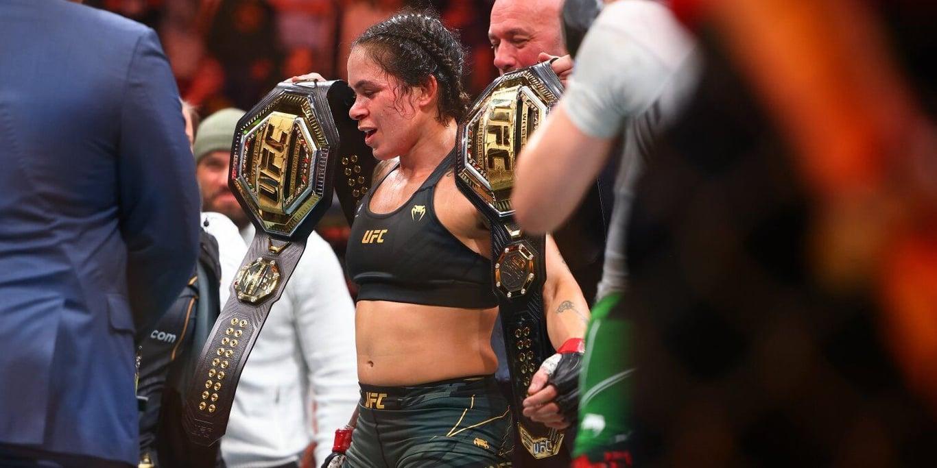 Amanda Nunes with both her belts at UFC 289. Credits to: Sergei Belski - USA TODAY Sports.