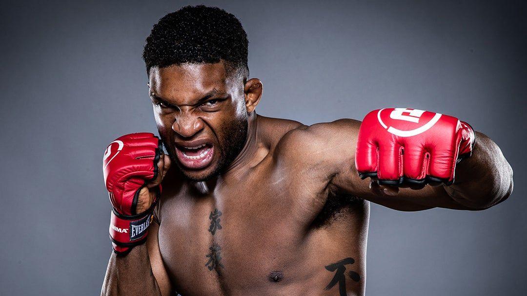 Paul Daley wearing the iconic red Bellator gloves. Credits to: BellatorMMA