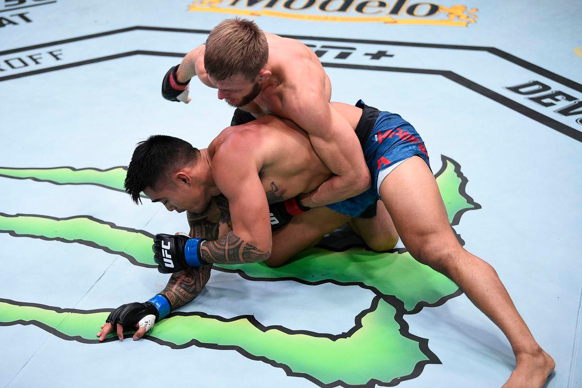 Jonathan Pearce fires off ground and pound at Kai Kamaka. Credit: MMA Fighting.