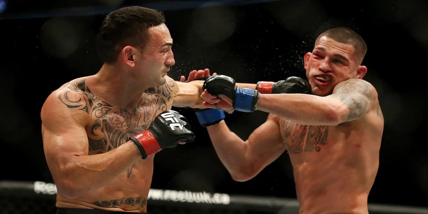 Max Holloway and Anthony Pettis headlining UFC 206 in Toronto, Canada. Credits to: Associated Press.