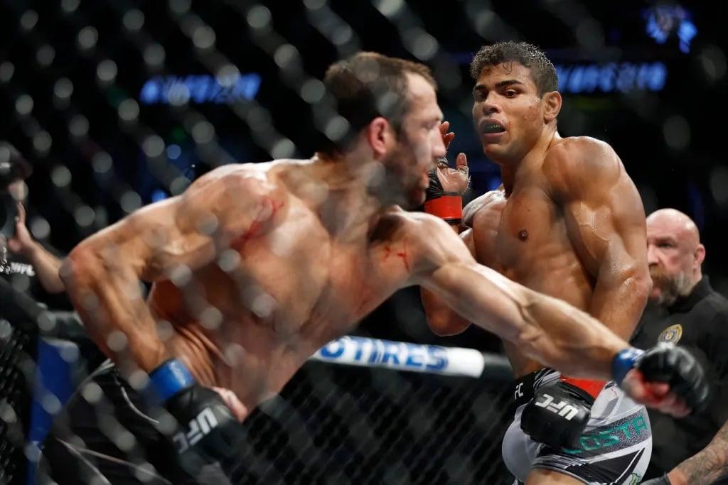 Paulo Costa and Luke Rockhold going to war at UFC 278. Credits to: Jeffrey Swinger - USA TODAY Sports.